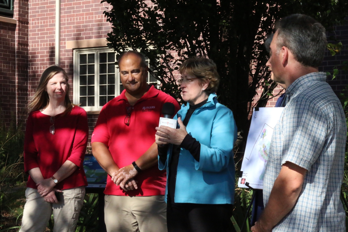 City of Summit Mayor Nora Radest joins representatives from the Summit Environmental Commission, the Rutgers Cooperative Extension Water Resources Program, and the Rahway River Watershed Association to celebrate the one-year anniversary of the installation of rain gardens at Summit City Hall and the Summit Free Public Library